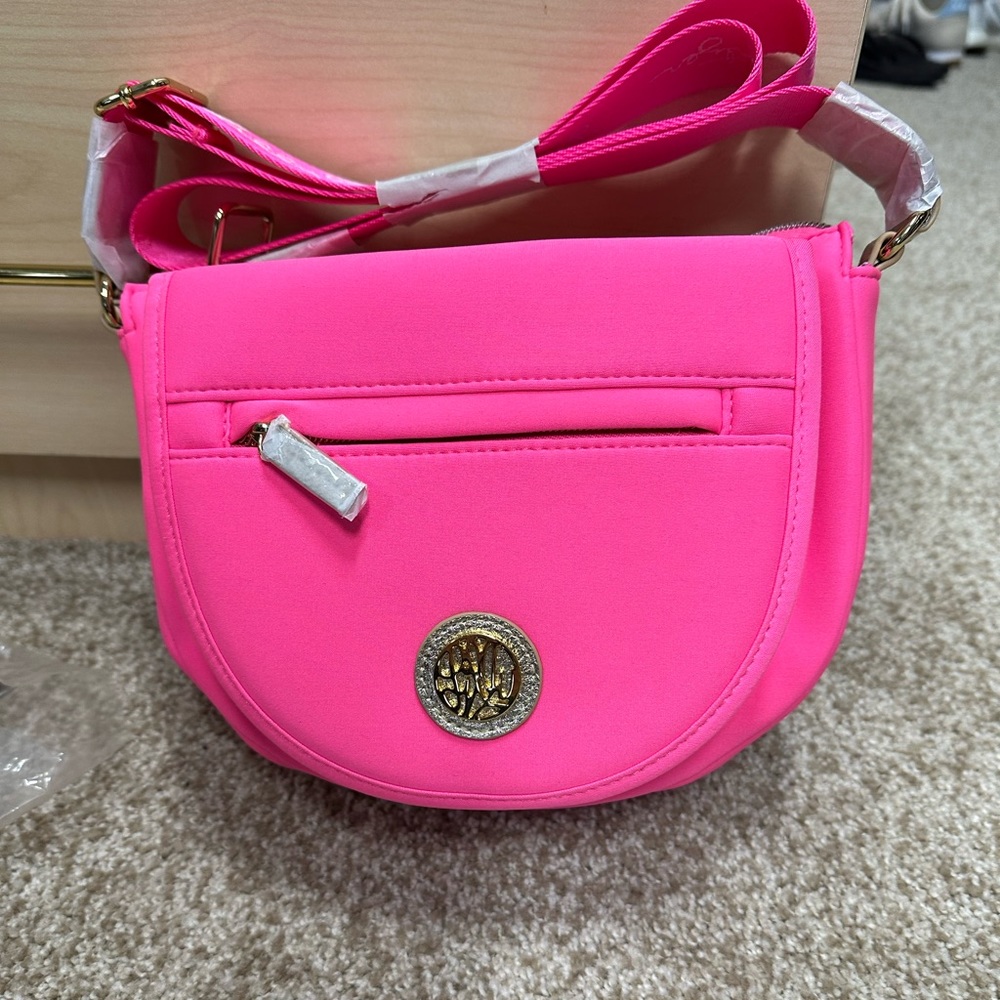 Lily Pulitzer pink crossbody purse.